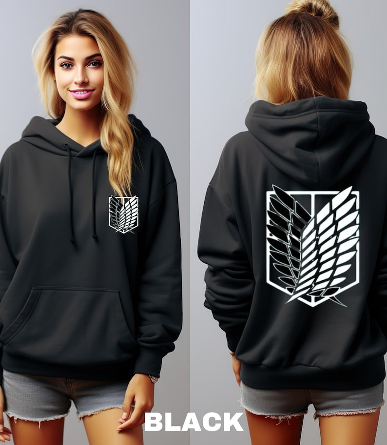 May include: Black hooded sweatshirt with a white graphic of the Attack on Titan symbol on the front and back.