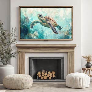 May include: A framed canvas art print featuring a sea turtle swimming in turquoise water. The turtle has a brown and green shell and is surrounded by coral and bubbles. The frame is a light brown color.