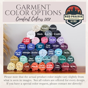 May include: A display of rolled fabric in various colors, including blue, green, and red, with labels such as "Denim," "Moss," and "Crimson." The image includes the text "GARMENT COLOR OPTIONS" and a logo for "Red Prairie Goods & Gifts."