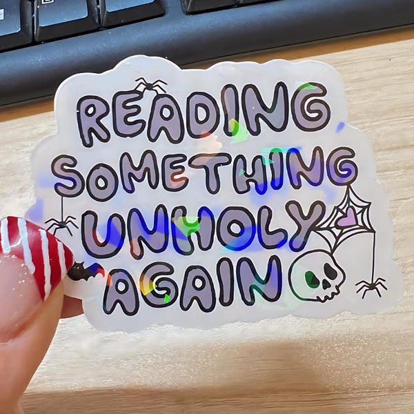 Reading Something Unholy Again Sticker | Funny Bookish Holographic Vinyl Sticker | Spooky Reader Laptop Decal