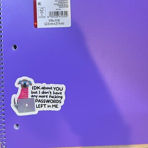 May include: A purple spiral notebook with a sticker that reads "IDK about YOU but I don't have any more fucking PASSWORDS LEFT in ME." The notebook is 9 inches by 11 inches (22.8 cm x 27.9 cm).