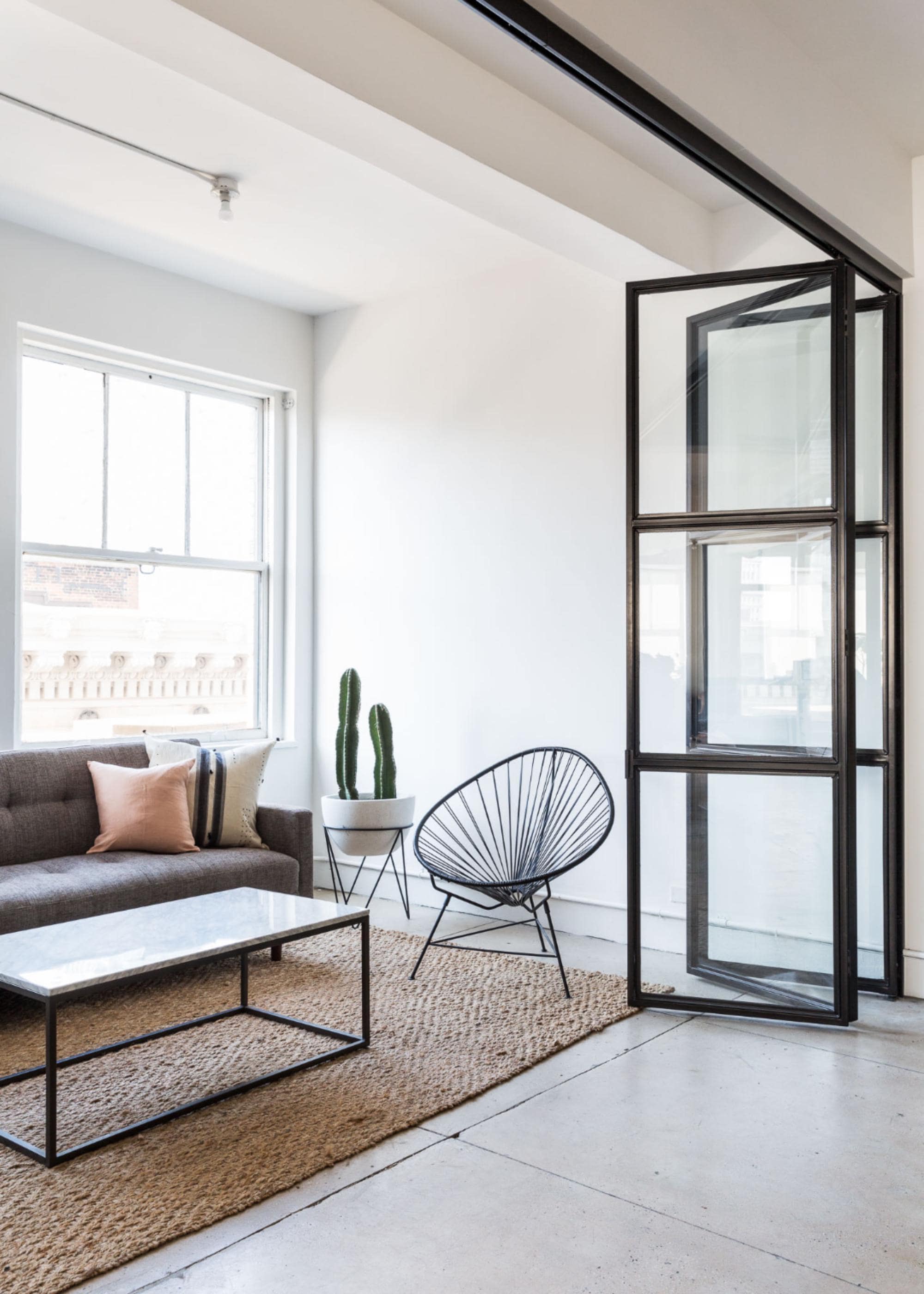 Custom Industrial Folding Steel and Glass Doors | Sound Deadening Room Divider for Conference Rooms and Home Offices
