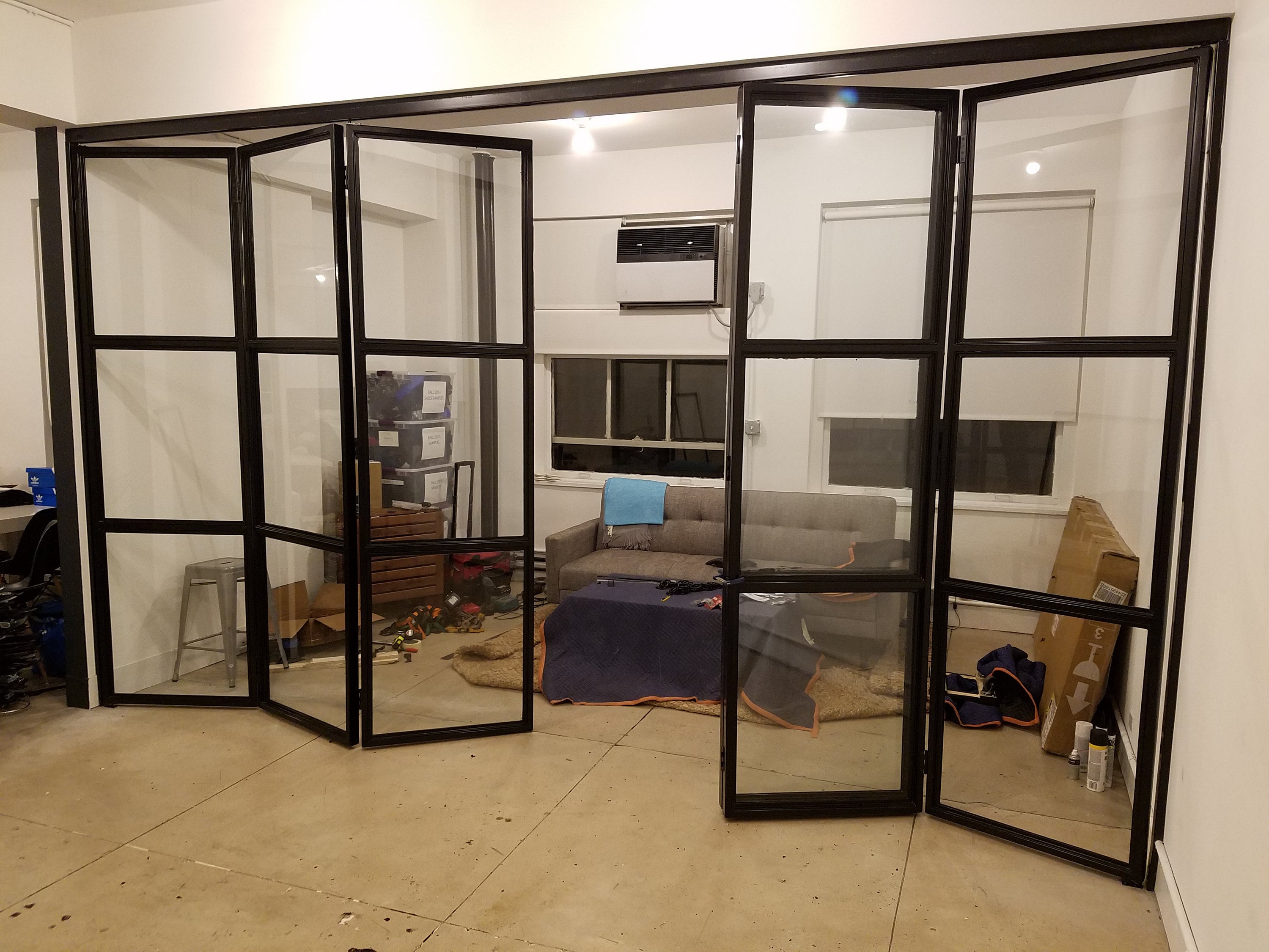 Custom Industrial Folding Steel Doors, Sound Deadening Room Separation