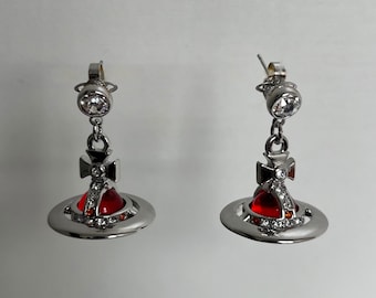 Vivienne Westwood silver earring dangling red pearl