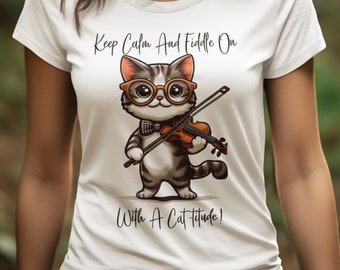 May include: White t-shirt with a cartoon cat wearing glasses and playing a violin. The text on the shirt reads "Keep Calm And Fiddle On With A Cat-titude!"