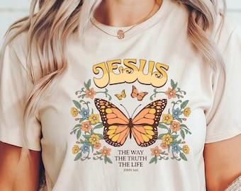 Camiseta cristiana de mariposa con versículo bíblico floral