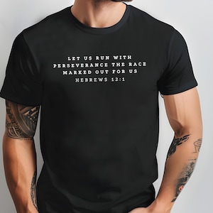 May include: Black t-shirt with white text that reads "Let us run with perseverance the race marked out for us Hebrews 12:1".