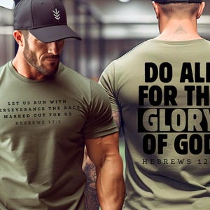 May include: A green t-shirt with black text that reads "Let us run with perseverance the race marked out for us Hebrews 12:1" on the front and "Do all for the glory of God Hebrews 12:1" on the back.