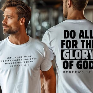May include: Two white t-shirts with black text. The front shirt says "Let us run with perseverance the race marked out for us Hebrews 12:1". The back shirt says "Do all for the glory of God Hebrews 12:1".