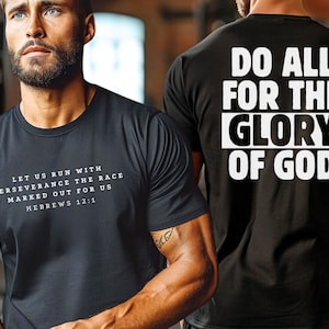 May include: Two black t-shirts with white text. The front shirt says "Let us run with perseverance the race marked out for us Hebrews 12:1". The back shirt says "Do all for the glory of God".