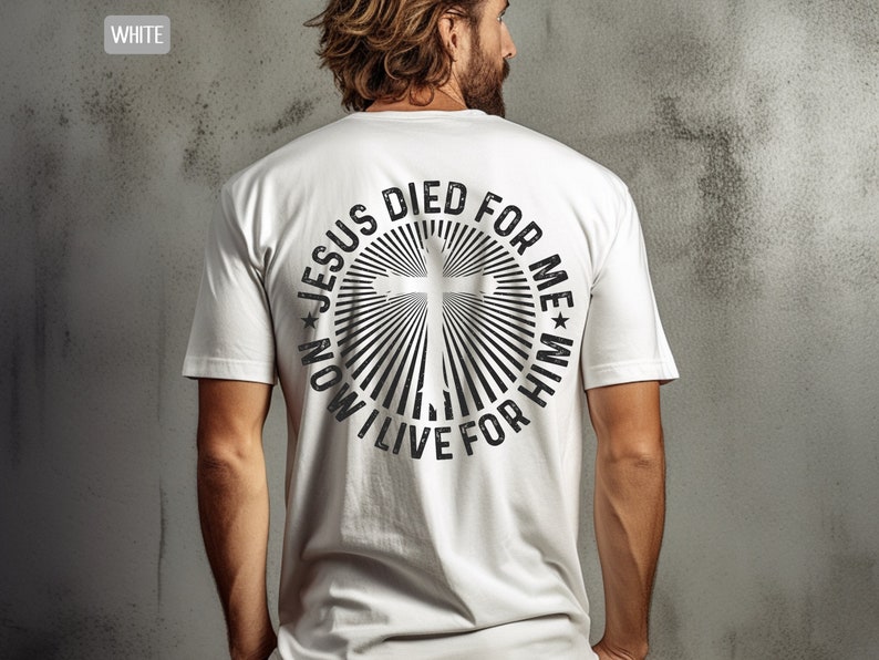 May include: White t-shirt with a black graphic print of a cross in a circle with the text "NOW I LIVE FOR HIM * JESUS DIED FOR ME *"