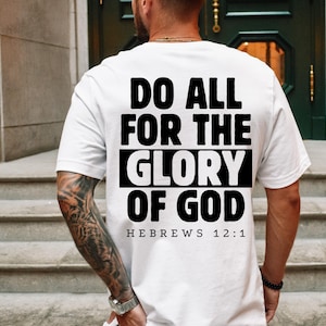 May include: White t-shirt with black text that reads "Do all for the glory of God Hebrews 12:1".