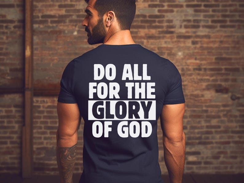 May include: A navy blue t-shirt with white text that reads "Do all for the glory of God".