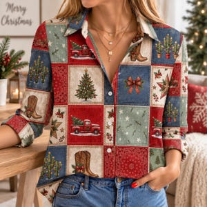 May include: A long-sleeve button-down shirt featuring a patchwork pattern of Christmas-themed illustrations including decorated pine trees, red pickup trucks carrying trees, cowboy boots, cacti with lights, bows, and stars in red, blue, and cream.