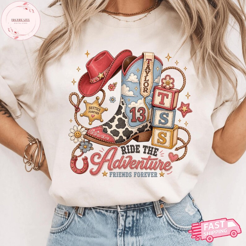 May include: A cream-colored t-shirt featuring a graphic print of a pink cowboy hat, a blue and white cow-print cowboy boot with the number 13, a sheriff badge labeled Besties Forever, three blocks labeled T S S, and the text Ride The Adventure Friends Forever.