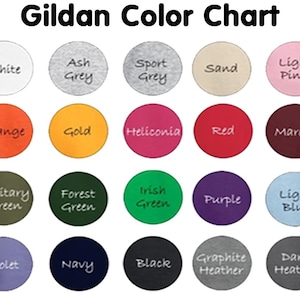 May include: A Gildan Color Chart featuring twenty circular color swatches arranged in four rows of five. Each circle displays a specific color name including White, Ash Grey, Sport Grey, Sand, Light Pink, Orange, Gold, Heliconia, Red, Maroon, Military Green, Forest Green, Irish Green, Purple, Light Blue, Violet, Navy, Black, Graphite Heather, and Dark Heather.