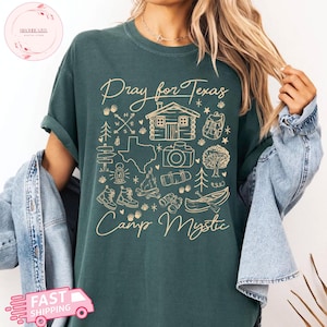 テキサスのために祈るシャツ キャンプミスティック洪水支援Tシャツ テキサスヒルカントリーコンフォートカラーズ落書き キャンパーの思い出 2025 テキサスストロングシャツ