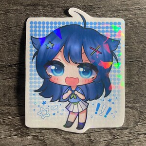 May include: A holographic sticker featuring a cartoon character with blue hair, blue eyes, and a blue and white sailor uniform. The character is smiling and holding their hands together in front of their chest. The background is a light blue with white polka dots and stars.