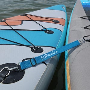 1 TURQUOISE/ WHITE SUPmates strap. 17" adjustable to 28". 1 inch webbing. Embroidered. Durable. Light. Ready to use!