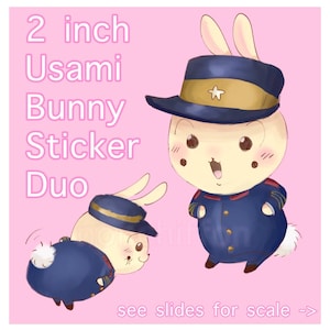 May include: A pink background features two Usami Bunny stickers. The stickers are of a bunny wearing a navy blue uniform and hat. The text on the image reads "2 inch Usami Bunny Sticker Duo" and "see slides for scale ->".