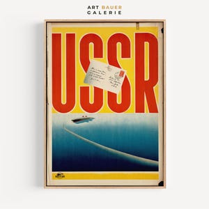 May include: A vintage travel poster with a yellow background and the word "USSR" in large red letters. A small envelope is attached to the "R" in the word. The poster depicts a ship sailing on a blue ocean.