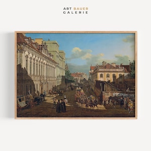 May include: Framed print of a vintage European street scene. The artwork depicts a bustling street with buildings, carriages, and people. The sky is blue with clouds. The text "ART BAUER GALERIE" is in the top center.
