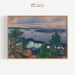 May include: Framed landscape painting with a wooden frame. The artwork depicts a coastal scene with green trees in the foreground, a body of water, and a cloudy sky. The text "ART BAUER GALERIE" is in the upper left corner.