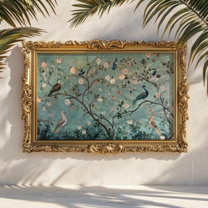 May include: A framed artwork featuring a teal background with a floral and bird design. The artwork showcases various birds perched on branches with pink flowers. The ornate gold frame adds a touch of elegance to the piece, suitable for home decor.