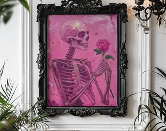 May include: A framed artwork featuring a pink skeleton holding a pink rose. The skeleton is set against a pink background. The ornate black frame adds a gothic touch to the artwork, suitable for home decor.