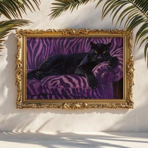 May include: A framed painting of a black panther reclining on a purple zebra-striped sofa. The painting is in an ornate gold frame, and the panther has yellow eyes. The artwork is set against a white wall with palm fronds.