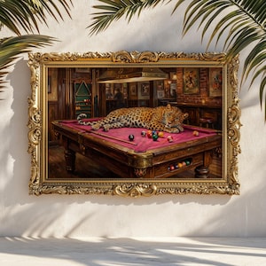 May include: A framed print depicting a leopard lounging on a red pool table. The setting is a dimly lit room with a bar visible in the background. The frame is gold and ornate.