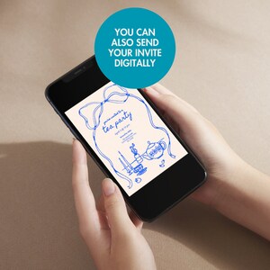 May include: A smartphone displaying a blue and white tea party invitation with the text "You're invited to a tea party" and "April 1st 3-5 pm". The invitation features a teapot, candles, and a teacup.