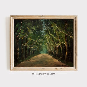 May include: A painting of a path lined with trees, illuminated by string lights. The path leads into a dark, forested area. The painting is framed in a light wood frame.
