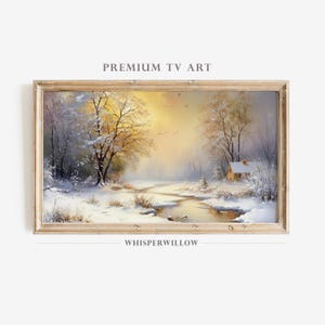 May include: A painting of a snowy winter scene with a small cabin in the distance. The trees are covered in snow and there is a stream running through the middle of the scene. The sky is a soft yellow and the sun is shining through the trees. The painting is framed in a light wood frame.