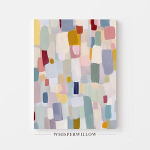 May include: Abstract art print featuring a colorful arrangement of brushstrokes in various shapes and sizes. The artwork incorporates a palette of soft pastels, including pink, blue, yellow, and green, with accents of darker hues. The text "WHISPERWILLOW" is at the bottom.
