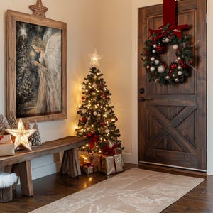 May include: A rustic wooden bench with a Christmas tree decorated with gold and red baubles, a wreath with red and silver baubles on the door, and a framed painting of an angel holding a candle.