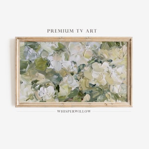 May include: Abstract painting in shades of green and white, featuring a floral motif. The painting is framed in a light wood frame and has the text "WHISPERWILLOW" below the image.  PREMIUM TV ART is written above the image.