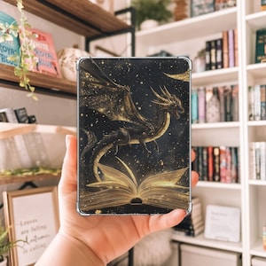 May include: A black dragon with gold wings flies out of an open book against a starry night background. The book is open and the pages are glowing gold.
