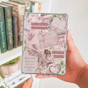 May include: A clear tablet case with a pink collage design featuring floral elements, butterflies, and text. The text includes phrases like "the world belongs to those who read" and "I'm literally just a girl."