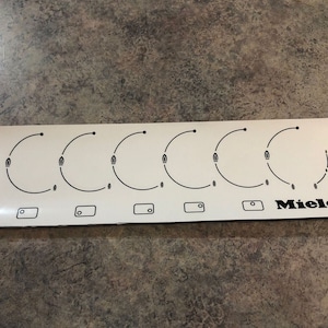Autocollant et logo Miele pour table de cuisson à gaz