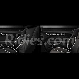 May include: A side-by-side comparison of two car seats. The left seat is labeled "Sports Seats" and the right seat is labeled "Performance Seats". Both seats are black and have a textured fabric.