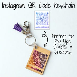 May include: A wooden Instagram QR code keychain with a purple and orange gradient QR code and a matching purple tassel. The keychain includes the text "Instagram QR Code Keychain" and the Instagram handle "@NADIA_HAIRNNAILS".