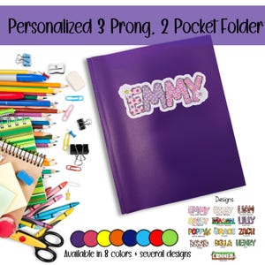 May include: A purple, personalized 3-prong, 2-pocket folder with the name "EMMY" in a decorative sticker. The image includes school supplies like pencils, crayons, and paper clips. The text says "Available in 8 colors + several designs."