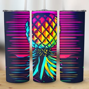 May include: Three stainless steel tumblers with a colorful pineapple design. The pineapple is a geometric pattern with a rainbow of colors. The background is a dark blue with pink, purple, and blue stripes.