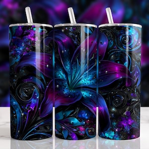 May include: Three tall, insulated tumblers with a vibrant floral design. The design features a large, stylized lily in shades of purple and teal against a dark, swirling background. Each tumbler has a white straw.