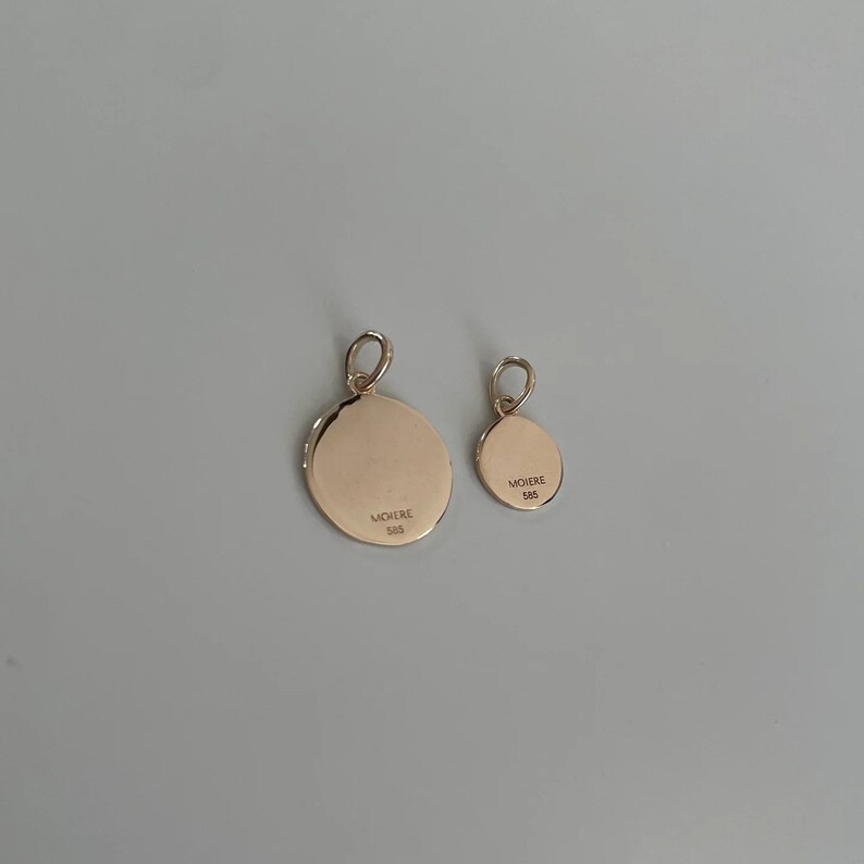 Gelbgold Anhänger Schmuck Goldschmuck 14 karat
zeitlose Eleganz Echtgold Accessoire
Goldanhänger