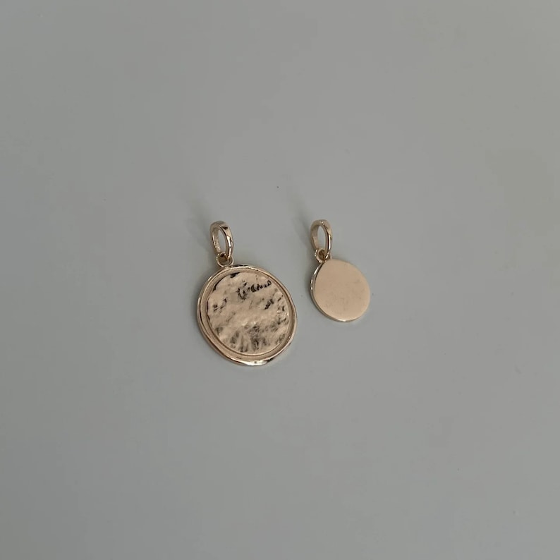Gelbgold Anhänger Schmuck Goldschmuck 14 karat
zeitlose Eleganz Echtgold Accessoire
Goldanhänger