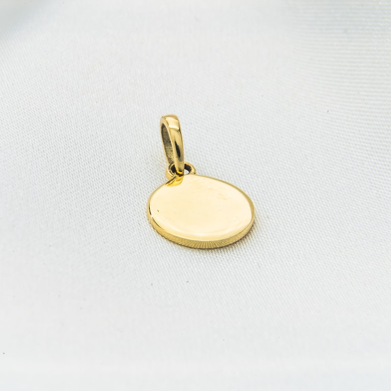 Gelbgold Anhänger Schmuck Goldschmuck 14 karat
zeitlose Eleganz Echtgold Accessoire
Goldanhänger