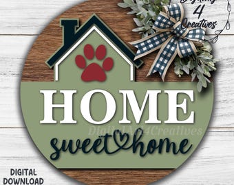 May include: A round wooden sign with a house graphic, a red paw print, and the word "HOME" in white. Below, the words "sweet home" are in a cursive font. The sign is decorated with a blue and white checkered bow and greenery. The words "DIGITAL DOWNLOAD" and file types are at the bottom.