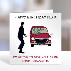 May include: A square greeting card with a white background featuring a black silhouette of a person standing next to a red car with a tree branch on the windscreen. The text reads HAPPY BIRTHDAY NICK and I'M GOING TO GIVE YOU DAMN GOOD THRASHING!